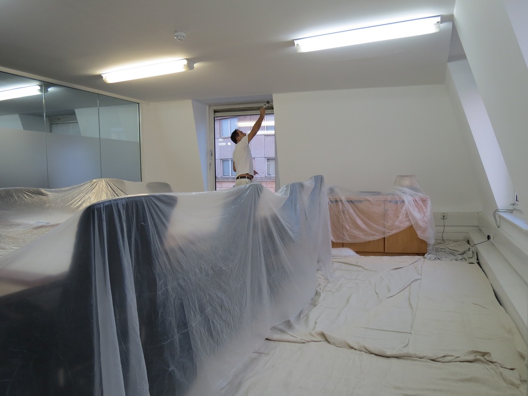 Mayfair Central London office painter painting walls and ceilings with dust sheets
