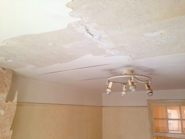 Central London Painters preparing a damaged ceiling