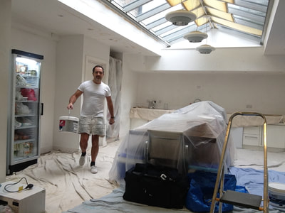 Central London Painter decorating a kitchen in Marylebone. Dustsheets down