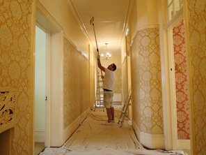 Painters in Maidavale painting an apartment in mansion block.